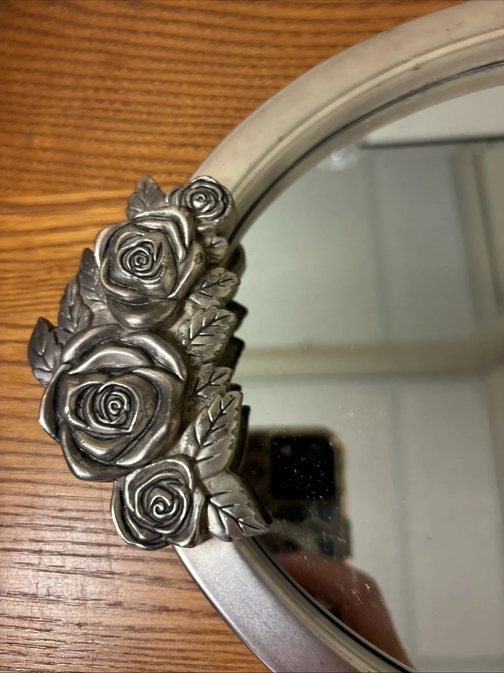 Elegant Silver Oval Wall Mirror with Rose Accents